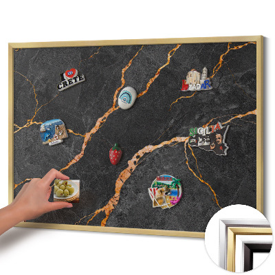 Magnetic board with a gold frame Decorated dark marble