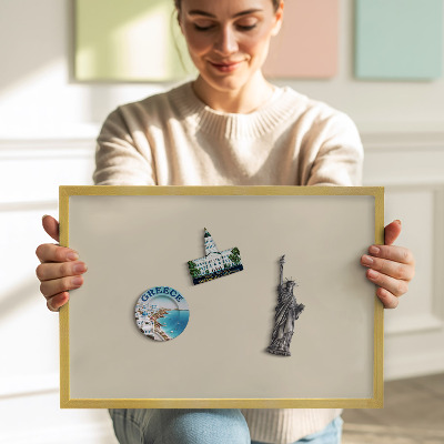Magnetic board with a gold frame Light beige color
