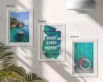 Photo frame wall with sea view, boat, bicycle, and inspirational inscription