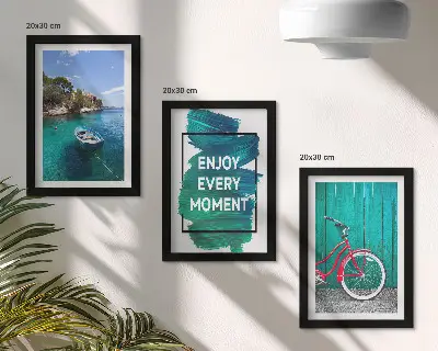 Photo frame wall with sea view, boat, bicycle, and inspirational inscription