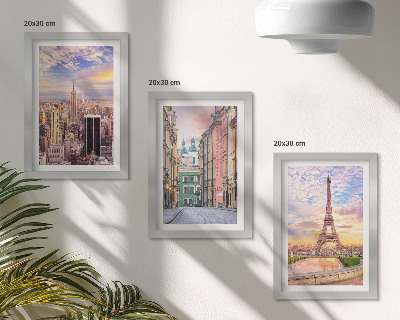 Photo frame wall View of the cities of New York, Paris and Warsaw at dusk