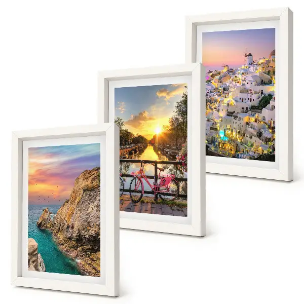 Seaside views with sunset and city framed triptych