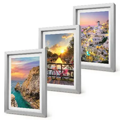 Seaside views with sunset and city framed triptych
