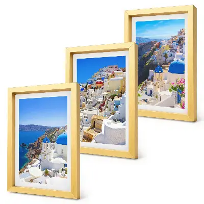 Photo frame wall featuring landscape architecture views of the city of Oia Santorini Greece