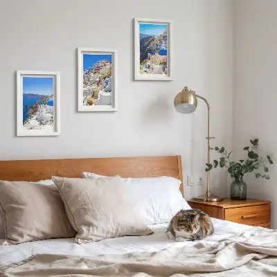 Photo frame wall featuring landscape architecture views of the city of Oia Santorini Greece