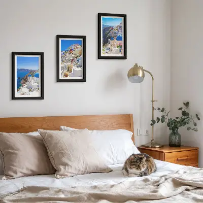 Photo frame wall featuring landscape architecture views of the city of Oia Santorini Greece