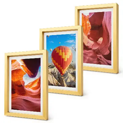 Landscapes of desert gorges and a balloon flight framed triptych