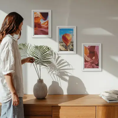 Landscapes of desert gorges and a balloon flight framed triptych