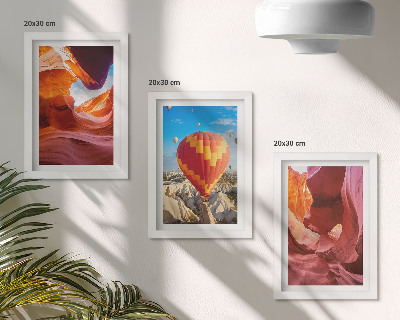 Framed triptych Landscapes of desert gorges and a balloon flight