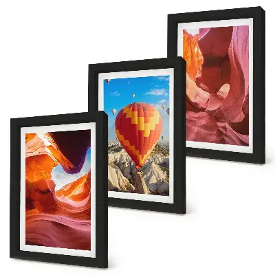 Landscapes of desert gorges and a balloon flight framed triptych
