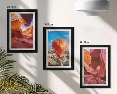 Landscapes of desert gorges and a balloon flight framed triptych