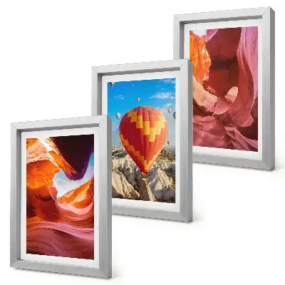 Landscapes of desert gorges and a balloon flight framed triptych