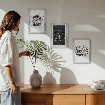 Photo frame wall with graphics featuring food and culinary slogans