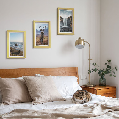 Framed triptych Mountain landscapes with a waterfall, a deer, and a beach