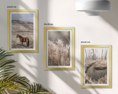 Photo frame wall Horses in a landscape of grasses and a winter stream