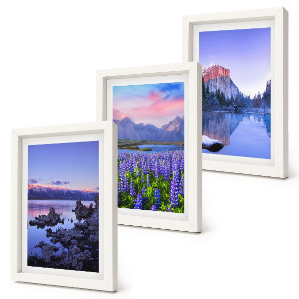 Framed triptych Mountain landscapes with water, sky and a field of flowers