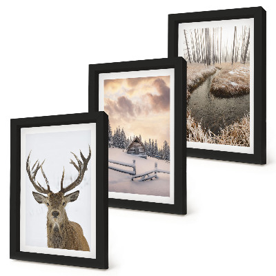 Photo frame wall Winter landscape with a deer hut and a stream