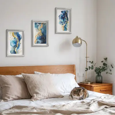 Photo frame wall with blue abstract patterns and delicate accents