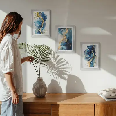Photo frame wall with blue abstract patterns and delicate accents