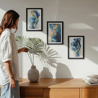 Photo frame wall with blue abstract patterns and delicate accents