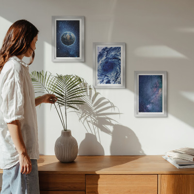Photo frame wall Earth in space, storm and galaxy of stars