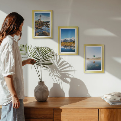 Photo frame wall Views of nature with a lighthouse, mountains, lake and balloon