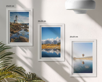 Photo frame wall Views of nature with a lighthouse, mountains, lake and balloon