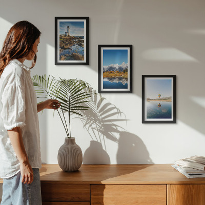 Photo frame wall Views of nature with a lighthouse, mountains, lake and balloon