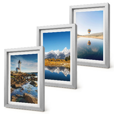Photo frame wall Views of nature with a lighthouse, mountains, lake and balloon
