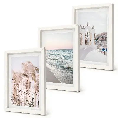 Seaside plants, sea waves, view of white houses framed triptych
