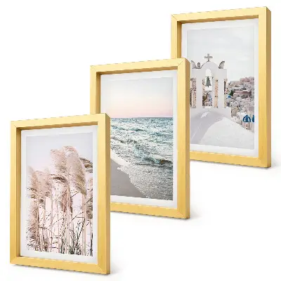 Seaside plants, sea waves, view of white houses framed triptych