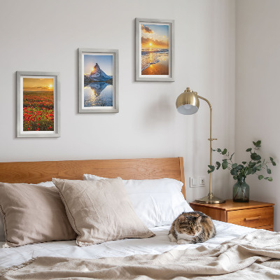 Framed triptych Mountain and seaside landscapes with sunsets