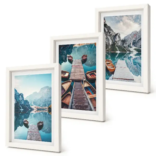 Photo frame wall calm lake with wooden piers and boats