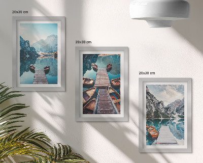 Photo frame wall A calm lake with wooden piers and boats