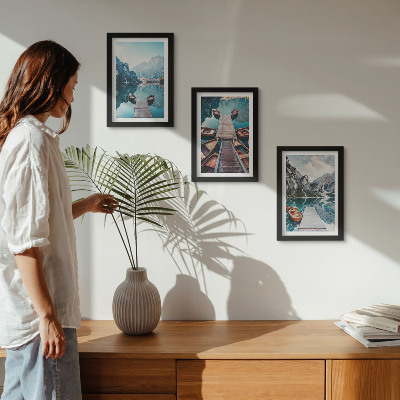Photo frame wall A calm lake with wooden piers and boats