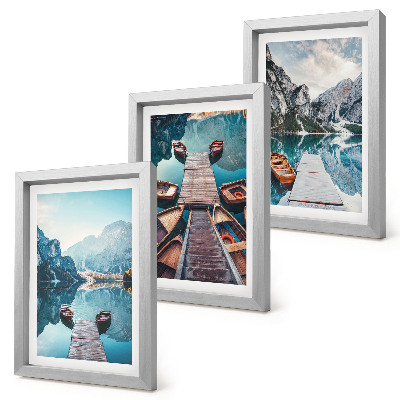 Photo frame wall A calm lake with wooden piers and boats