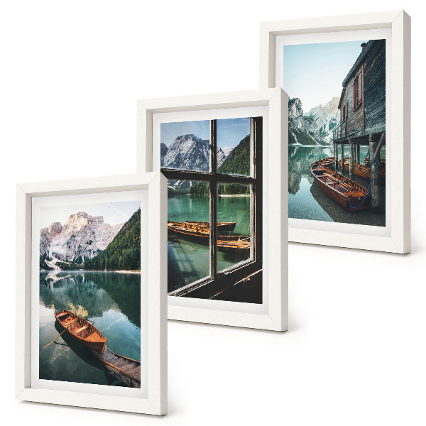 Framed triptych View of a mountain lake with boats and a house by the water