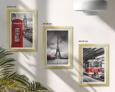 Photo frame wall featuring iconic London and Paris cityscapes with rail transport