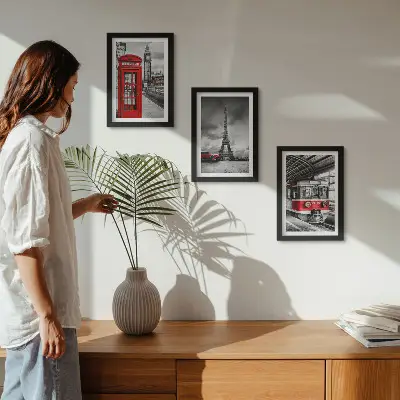 Photo frame wall featuring iconic London and Paris cityscapes with rail transport