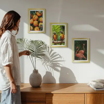 Photo frame wall with tropical fruity accents featuring parrots and flamingos