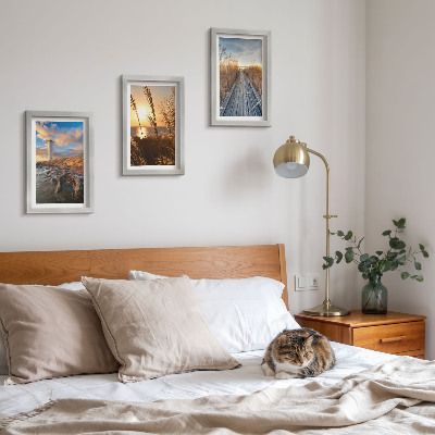 3-piece wall art set View of the lighthouse by the sea, grass and a wooden pier