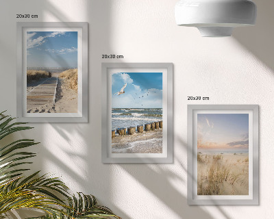 Photo frame wall Beach with sand, waves, sky and birds in flight