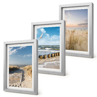 Photo frame wall Beach with sand, waves, sky and birds in flight