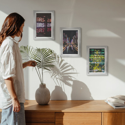 3-piece wall art set Neon signs of the city at night with a view of the river