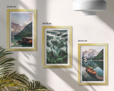 Photo frame wall Mountain landscapes with a lake, a boat, and a forest in the fog
