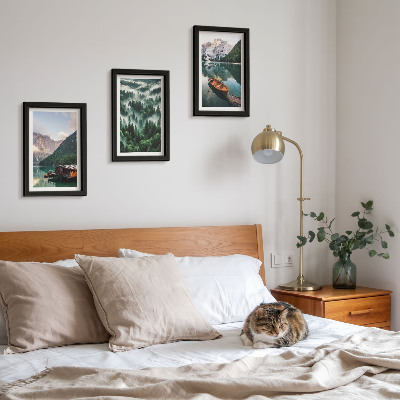 Photo frame wall Mountain landscapes with a lake, a boat, and a forest in the fog