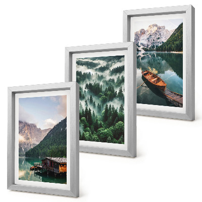 Photo frame wall Mountain landscapes with a lake, a boat, and a forest in the fog