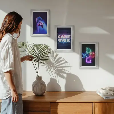 Gamepads with Game Over icons framed triptych