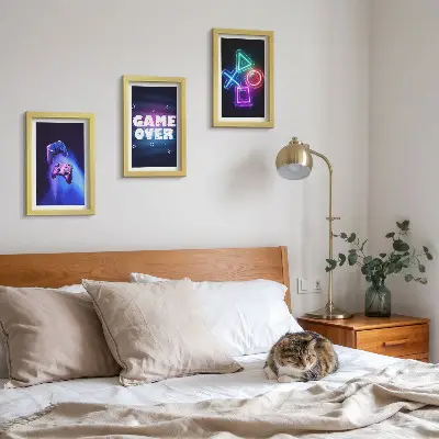 Gamepads with Game Over icons framed triptych