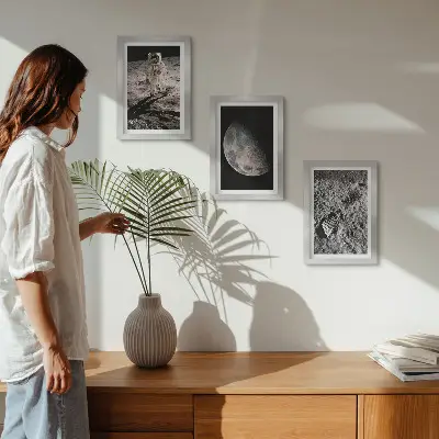 Photo frame wall featuring an astronaut on the moon footprint